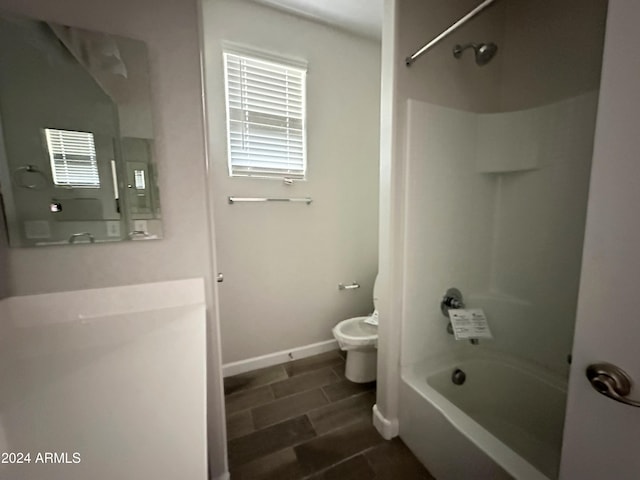 full bathroom with shower / bathing tub combination, vanity, and toilet