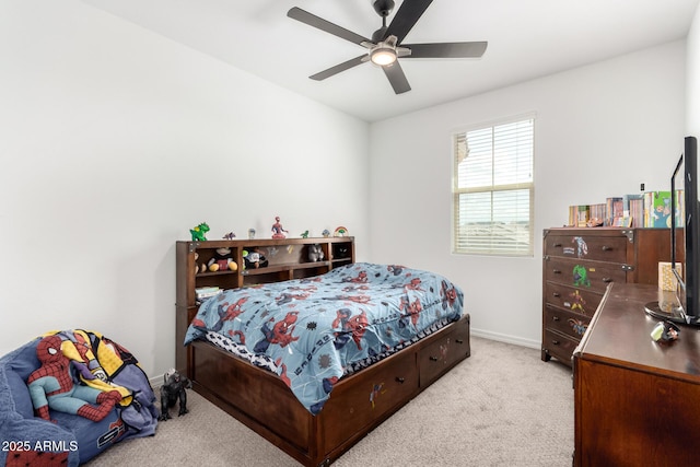 bedroom with light carpet, baseboards, and ceiling fan
