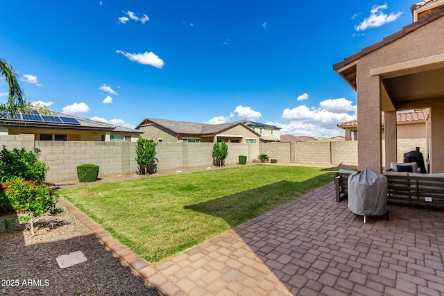 view of yard featuring a patio and a fenced backyard