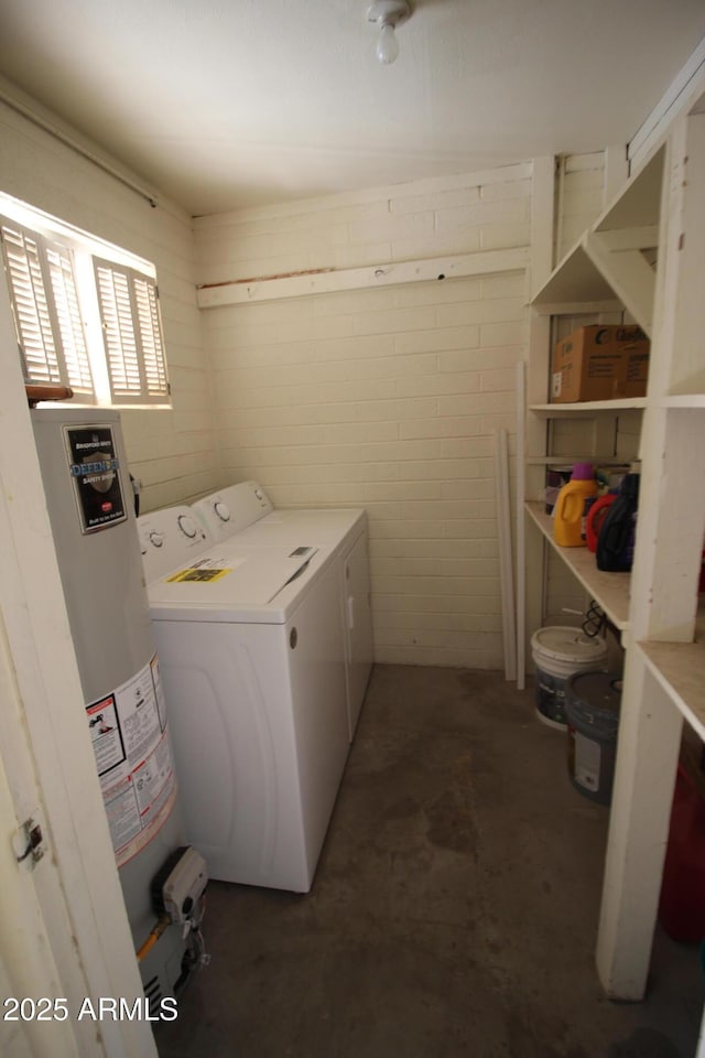 laundry room featuring washer / dryer and gas water heater