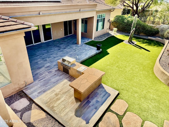 exterior space featuring a patio area and area for grilling