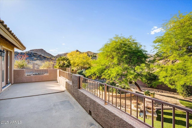 balcony featuring a mountain view