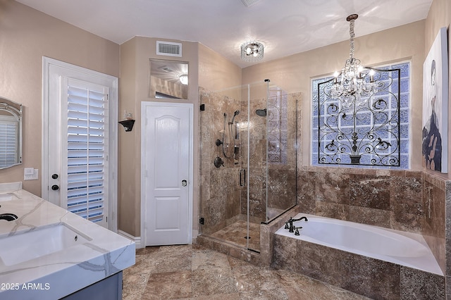 bathroom featuring a sink, visible vents, a shower stall, a bath, and double vanity