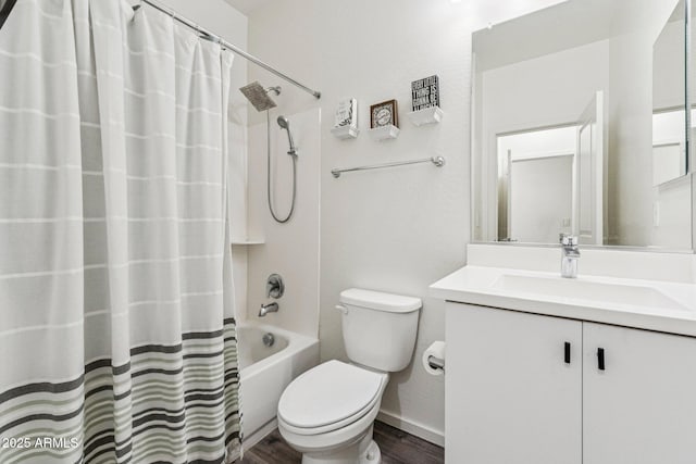 2313 E Hidalgo Ave, Phoenix, AZ 85040 - bathroom featuring vanity, wood finished floors, and shower / tub combo with curtain