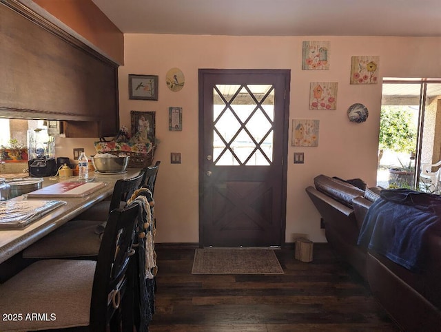 foyer with wood finished floors