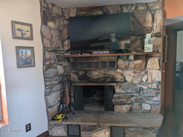 room details with visible vents and a fireplace