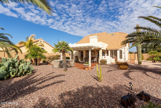 back of house featuring a pergola and a patio