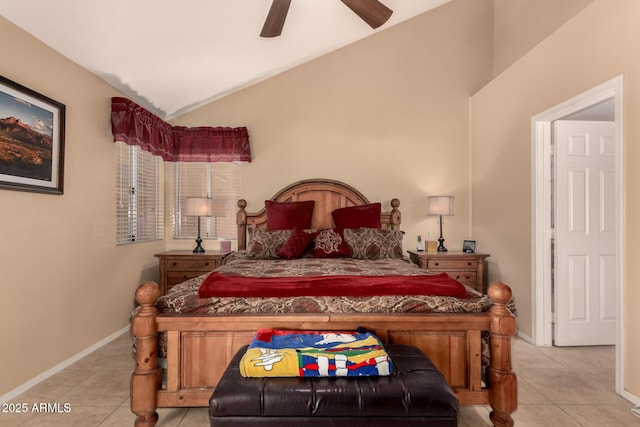 tiled bedroom featuring ceiling fan and vaulted ceiling