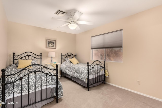 bedroom featuring light carpet and ceiling fan