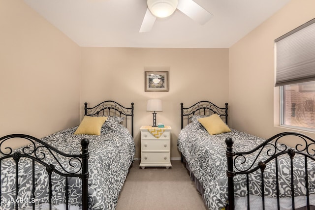 bedroom featuring ceiling fan and light colored carpet