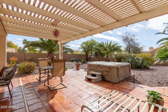 view of patio featuring a hot tub and a pergola