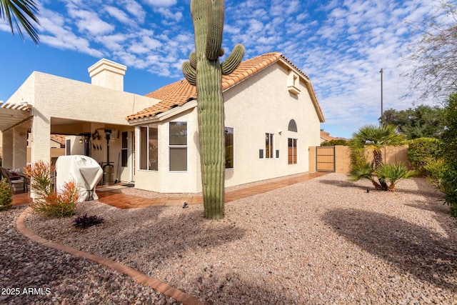 back of property with a patio area