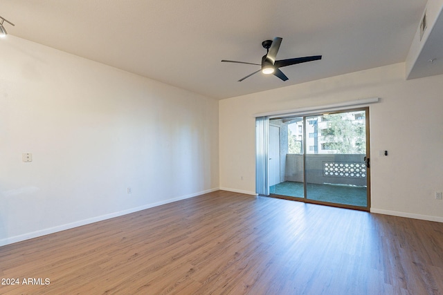 unfurnished room with light hardwood / wood-style flooring and ceiling fan