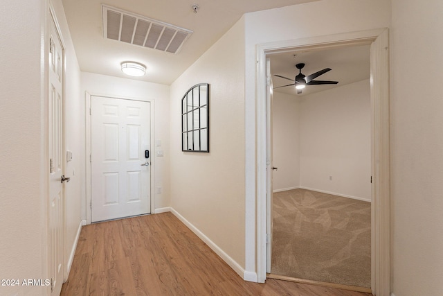 hall featuring light hardwood / wood-style floors