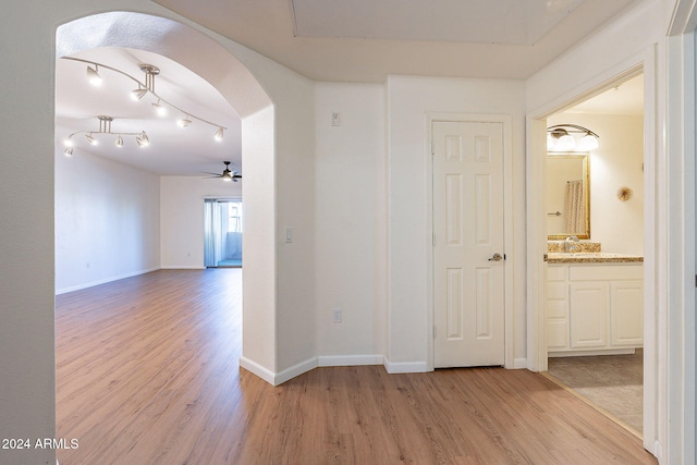 hall featuring light wood-type flooring