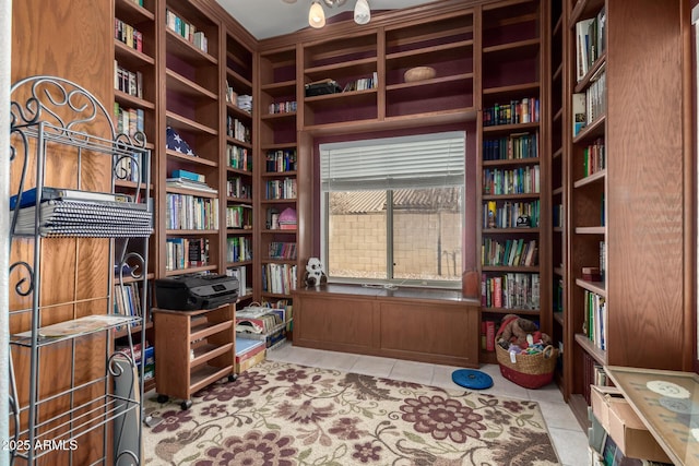 misc room with light tile patterned floors