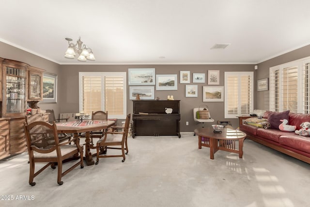 dining room with a notable chandelier, crown molding, and light carpet