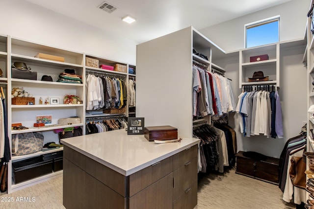 8145 E Tecolote Cir, Scottsdale, AZ 85266 - walk in closet featuring visible vents and light colored carpet