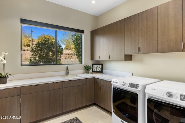8145 E Tecolote Cir, Scottsdale, AZ 85266 - laundry room featuring plenty of natural light, independent washer and dryer, a sink, and cabinet space