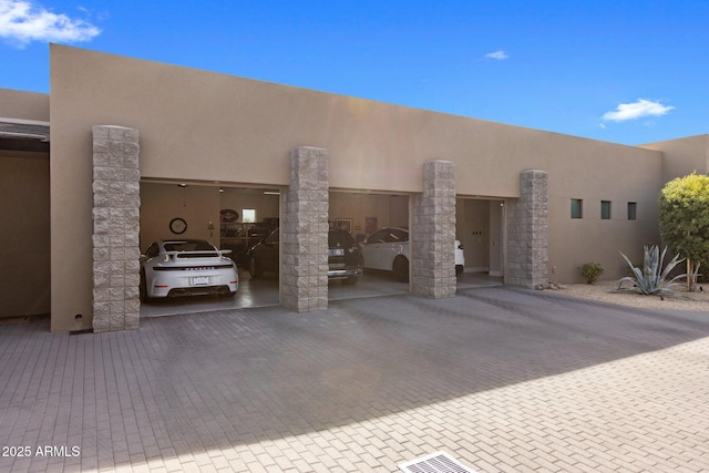 8145 E Tecolote Cir, Scottsdale, AZ 85266 - view of front of property featuring decorative driveway and stucco siding