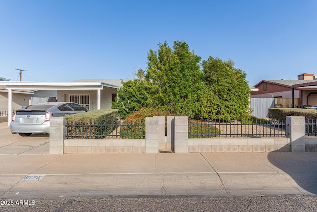 view of front facade with a carport