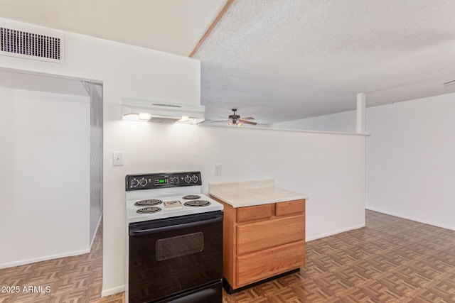 kitchen featuring ceiling fan, dark parquet floors, range hood, range with electric stovetop, and a textured ceiling