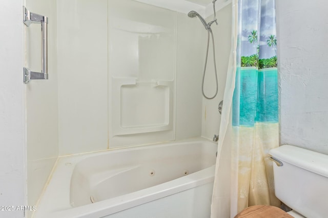 bathroom featuring shower / tub combo with curtain and toilet