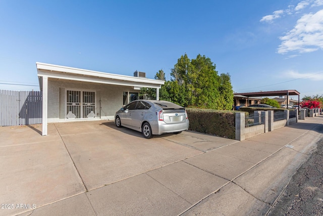 view of front of house featuring a carport