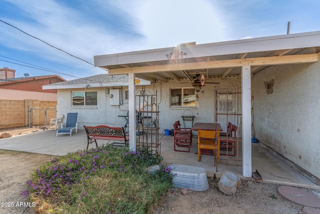 rear view of house featuring a patio