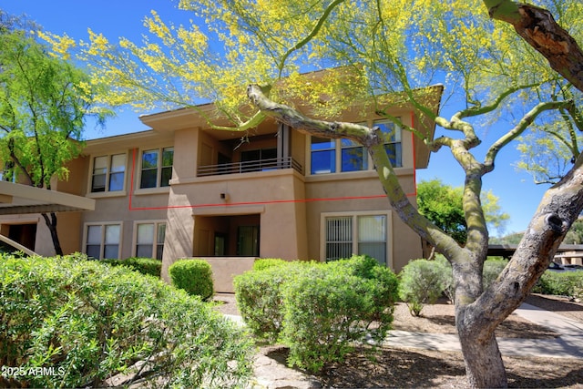 20100 N 78th Pl Unit 2105, Scottsdale, AZ 85255 - rear view of house with stucco siding and a balcony