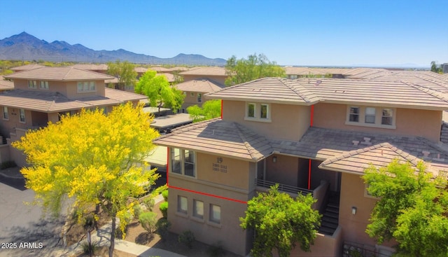20100 N 78th Pl Unit 2105, Scottsdale, AZ 85255 - exterior space with stairway, a tiled roof, stucco siding, and a mountain view