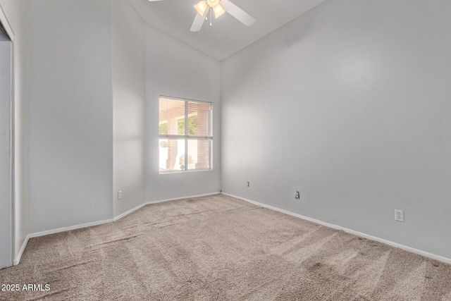 871 W Mesquite St, Gilbert, AZ 85233 - carpeted empty room with high vaulted ceiling and a ceiling fan