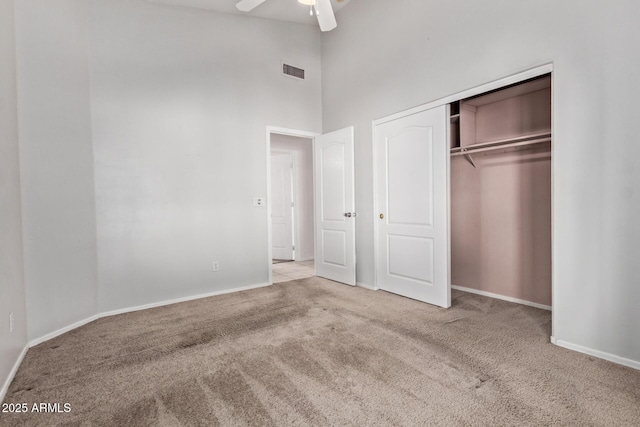 871 W Mesquite St, Gilbert, AZ 85233 - unfurnished bedroom with carpet flooring, a towering ceiling, a closet, and a ceiling fan