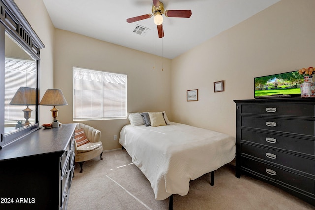 carpeted bedroom featuring ceiling fan