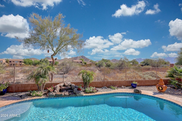 view of pool featuring a mountain view