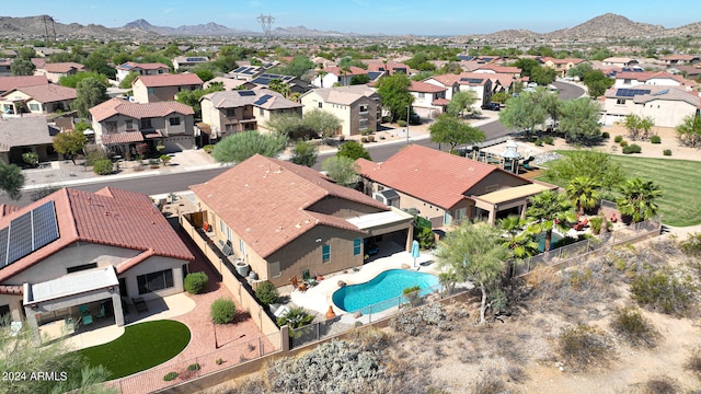 birds eye view of property featuring a mountain view