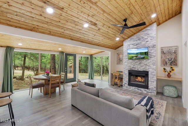 3674 N Navajo Dr, Pine, AZ 85544 - living room with high vaulted ceiling, healthy amount of natural light, wooden ceiling, ceiling fan, and a fireplace