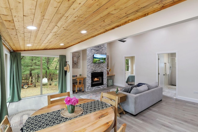 3674 N Navajo Dr, Pine, AZ 85544 - living room featuring wooden ceiling, a fireplace, light wood-style flooring, baseboards, and recessed lighting