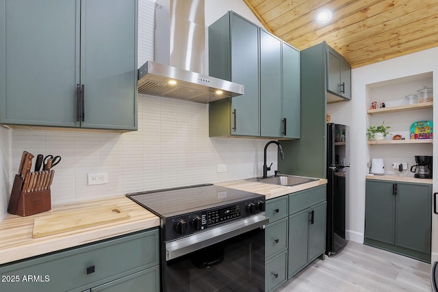 3674 N Navajo Dr, Pine, AZ 85544 - kitchen with wall chimney exhaust hood, range with electric cooktop, a sink, wood ceiling, and freestanding refrigerator