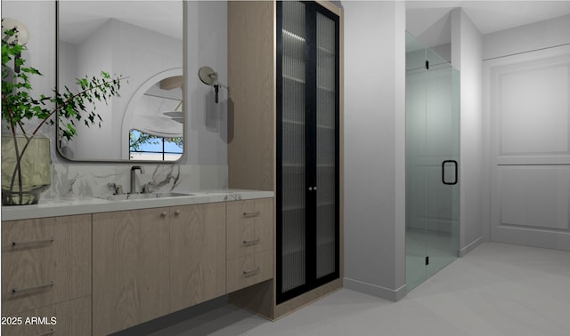 bathroom featuring vanity and a shower with shower door