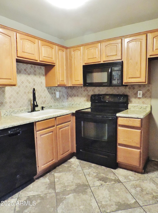 30 E Brown Rd Unit 2113, Mesa, AZ 85201 - kitchen featuring black appliances, decorative backsplash, light countertops, and light brown cabinets