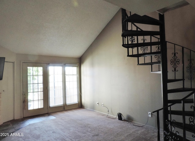 30 E Brown Rd Unit 2113, Mesa, AZ 85201 - unfurnished living room with carpet, lofted ceiling, and a textured ceiling