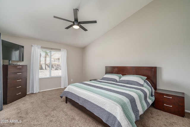 bedroom featuring lofted ceiling, carpet flooring, baseboards, and ceiling fan