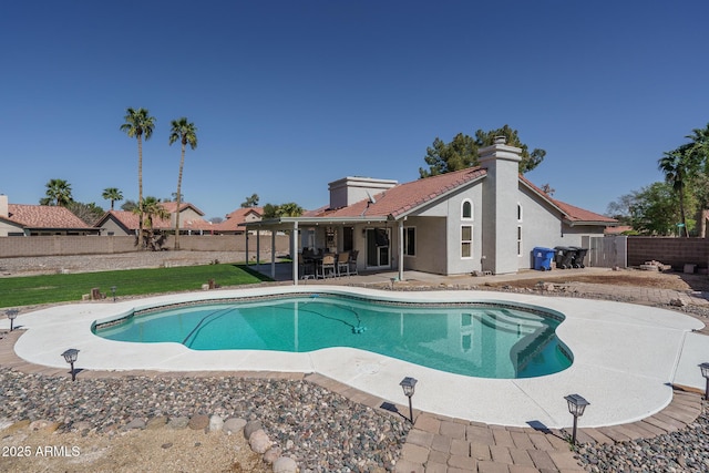 view of pool featuring a patio, a fenced backyard, and a fenced in pool