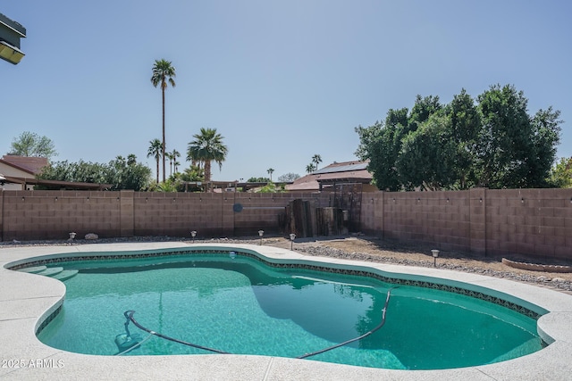 view of pool featuring a fenced backyard and a fenced in pool