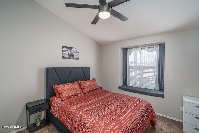 bedroom with baseboards, lofted ceiling, carpet, and ceiling fan