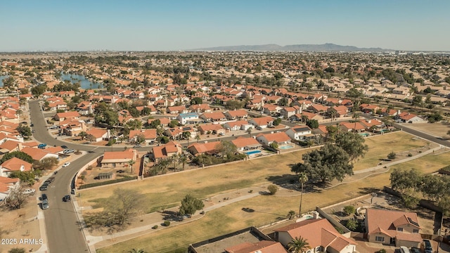 drone / aerial view featuring a mountain view and a residential view