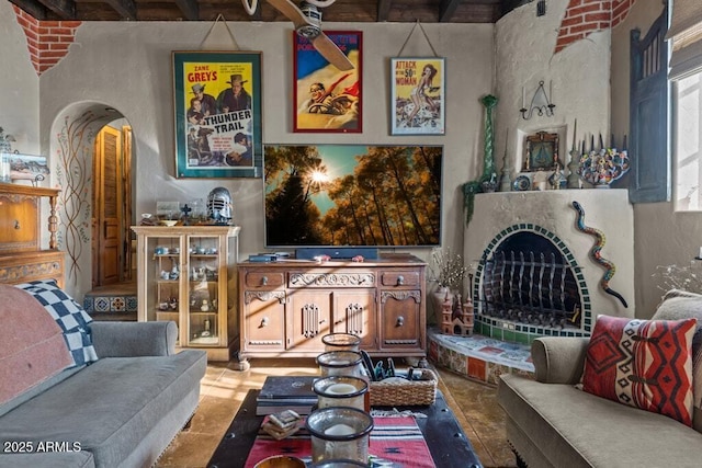 14 Black Knob Vw, Bisbee, AZ 85603 - living area with beamed ceiling, arched walkways, and a textured wall