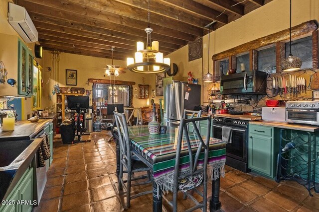 14 Black Knob Vw, Bisbee, AZ 85603 - kitchen featuring appliances with stainless steel finishes, green cabinets, a wall mounted AC, and a chandelier