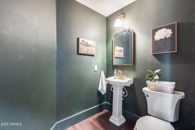 2402 E 5th St Unit 1742, Tempe, AZ 85288 - bathroom featuring toilet and hardwood / wood-style floors